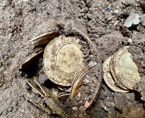 A couple living in a historical home in a village in North Yorkshire, England found a rare coin hoard, more than 260 coins, under the kitchen floor they were renovating, and soon they will receive a small fortune from the auctioneer. Source: Spink & Son