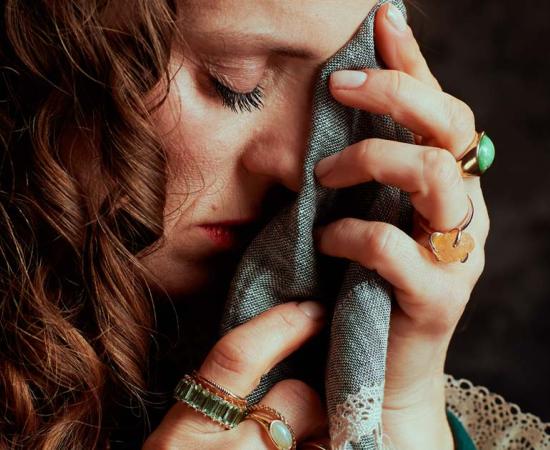 Medieval queen dabs sweat from her brow. Source: Alliance / Adobe Stock.