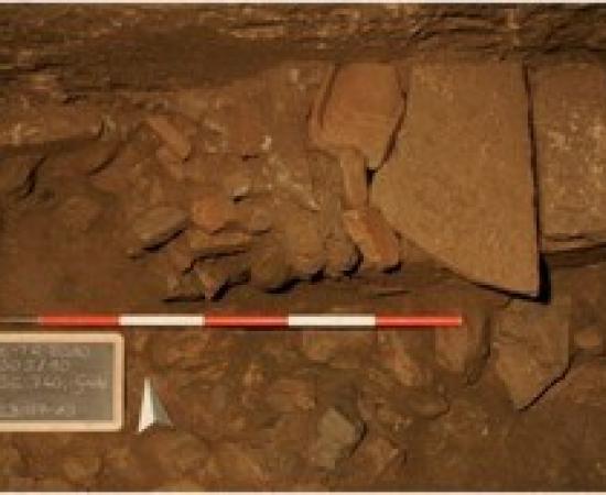  Excavation sequence showing the stone-and-brick cist grave of two newborn infants discovered inside a disused Roman latrine channel beneath the Odeion