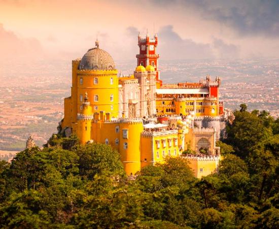 Pena Palace at sunset, Sintra, Portugal. Source: onnybas / Adobe Stock