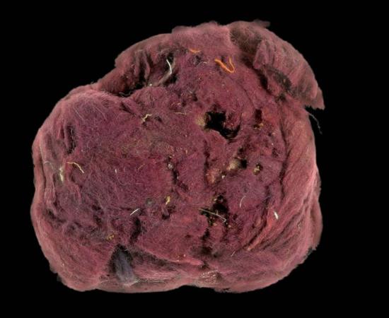 2,000-year-old textile fibers showing red-blue plant-based dye residues .