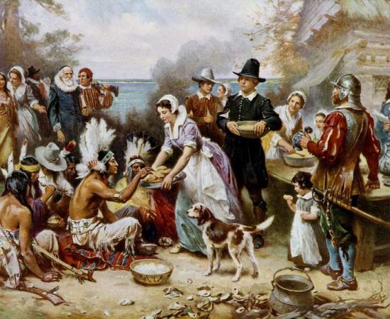 : “The First Thanksgiving 1621, oil on canvas by Jean Leon Gerome Ferris (1899). The painting shows common misconceptions about the event that persist to modern times: Pilgrims did not wear such outfits, and the Wampanoag are dressed in the style of Native Americans from the Great 