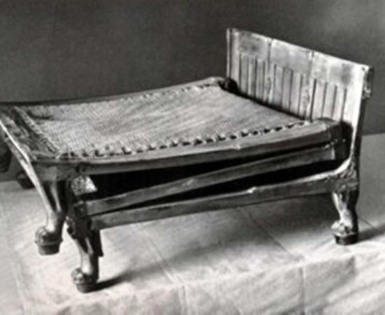 Photo of camping bed found in Tutankhamun tomb. By Harry Burton