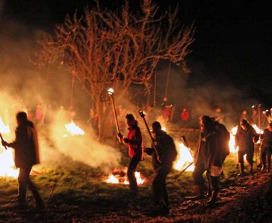 Wassailing revelers at night – CC BY-SA 2.0