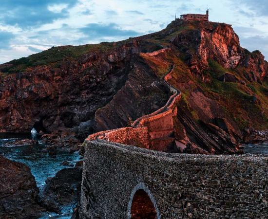 Sunrise on the San Juan de Gaztelugatxe Island, Spain. Source: samael334/Adobe Stock