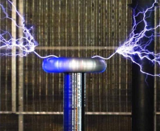 Flash Tesla coil experiment. Source: Public Domain