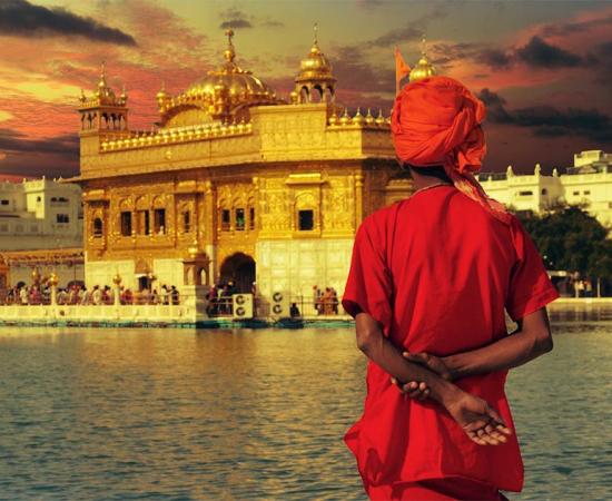 Pilgrim at the golden temple in the city of Amritsar-India, main temple of Sikhs, during sunset.            Source: MICHEL / Adobe Stock