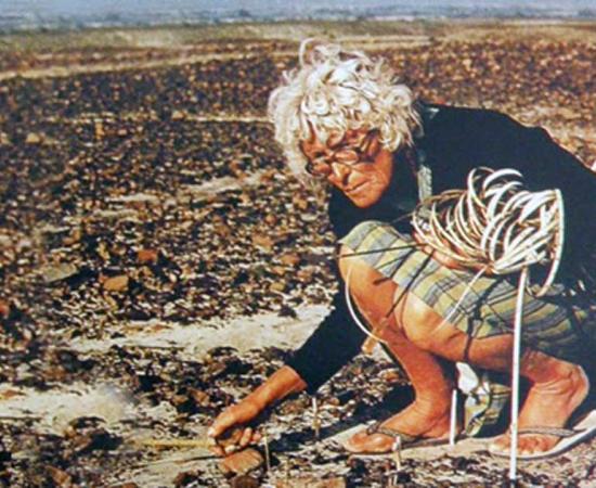 Maria Reiche measuring the Nazca Lines.