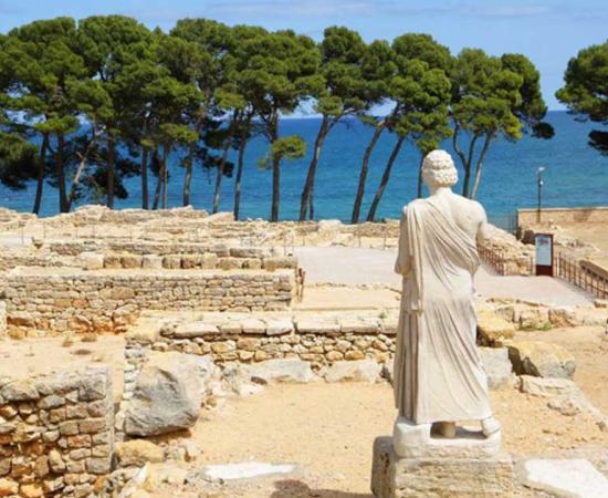 Statue and ruins at Empúries (Ampurias), Spain. 