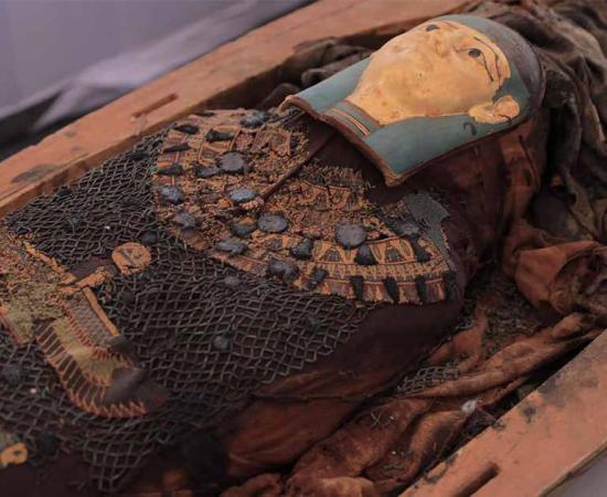 A carved and painted wooden coffin, depicting "Ta Djesa," the daughter of a high priest of Jehuty in Ashmunein uncovered at the Griefa cemetery Egypt.   Source: Ministry of Antiquities