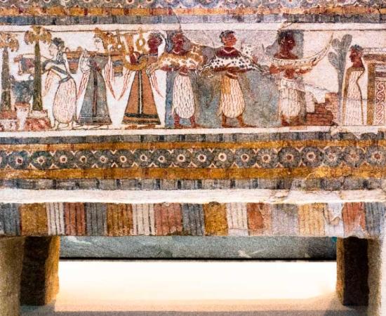 One of the long sides of the Hagia Triada Sarcophagus, showing Minoan burial practices  Source: Deyan Vasilev / CC BY SA 3.0