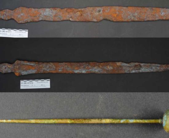 Top; The short Hallstatt sword with design was characteristic of the Bronze Age. Middle; Longer sword, designed to take advantage of the stronger properties of iron and was dated to the very beginnings of the Iron Age.	Bottom; Bowl-head pin made of a non-ferrous metal alloy. 