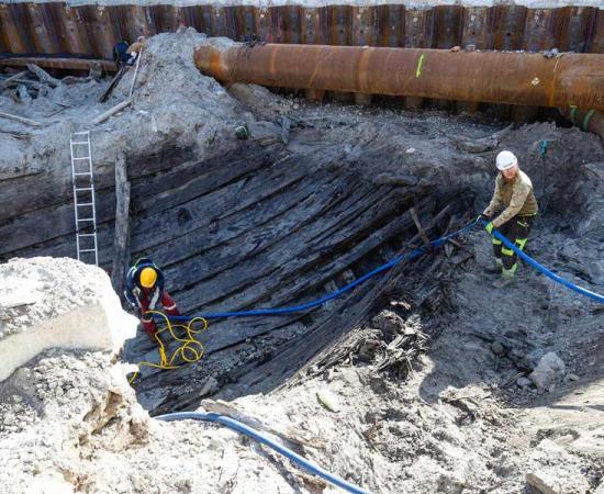 This Hanseatic League ship, which may exceed the Bremen Cog for preservation quality, was miraculously discovered 5 feet (1.5 meters) beneath the streets of Tallinn, Estonia’s capital.	 	Source: Patrik Tamm / ERR