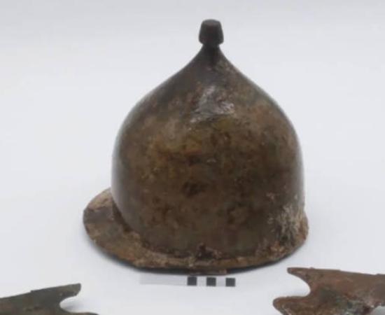 The recovered Montefortino helmet showing exceptional preservation. 