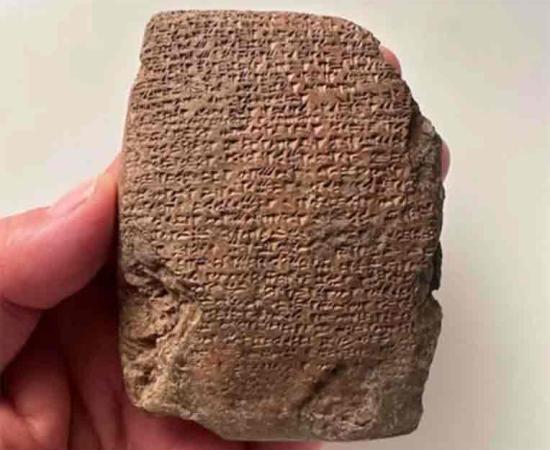 The ancient Hittite tablet features cuneiform text in both Hittite and Hurrian languages, with the Hittite inscription recounting the onset of war and the Hurrian inscription constituting a prayer for victory.	Source: Kimiyoshi Matsumura/Japanese Institute of Anatolian Archaeology