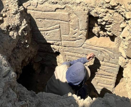 Archaeologist investigating the 3D polychrome mural 