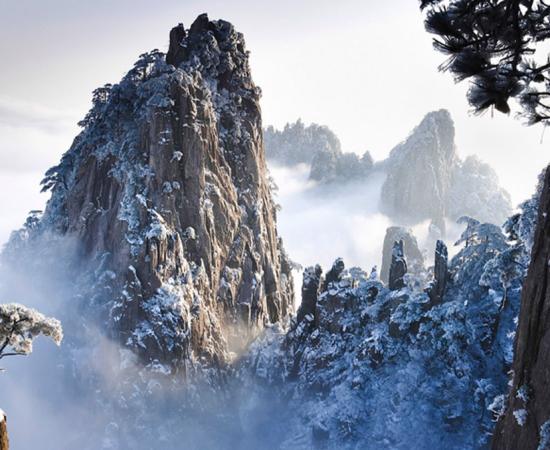 Taking Beauty to New Heights in China: What Stunning Sights Emerge on Huangshan and its Bridge of Immortals?