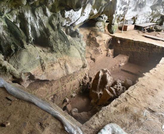 An overview of the trench in the rock-shelter area at Leang Bulu Bettue, Sulawesi, from where the human remains have been excavated.		Source: Brumm et al., 2021, PLoS ONE /CC-BY 4.0 