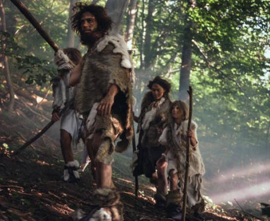 Top image: Tribe of Hunter-Gatherers Wearing Animal Skin Holding Stone Tipped Tools, Explore Prehistoric Forest in a Hunt for Animal Prey.