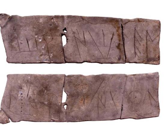 The bent Iberian lead plate, with its strange inscription, found at the Pico de Los Ajo (Yátova) in a nearby ancient metal recycling site. Source: University of Valencia