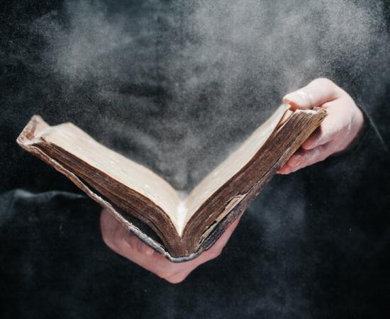 Reading religious book. Source:  4Max / Adobe Stock