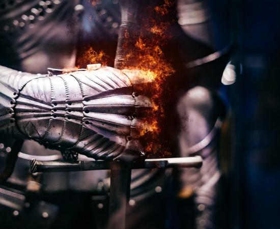 Medieval steel armor and iron gloved hands were products of Iron Age Europe. 		Source: Atmosphere / Adobe Stock