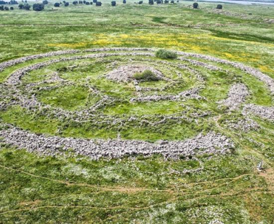 Aerial view of the ancient Rujm el-Hiri megalithic monument in the Golan Heights