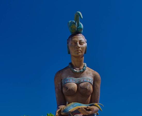 The Maya goddess Ix Chel wearing a coiled snake headdress