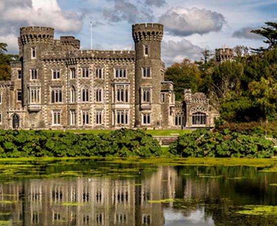  Johnstown Castle, Murrintown, with refection in its lake, Wexford, Ireland. Source: Mike Searle/CC BY-SA 2.0