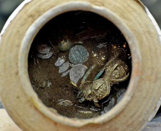 Clay pot full of coins and precious metal objects found at Kaliakra fortress