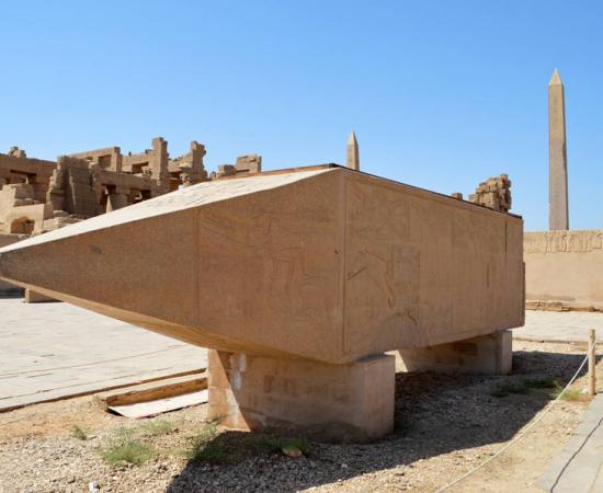 The upper third of the original Karnak obelisk, one of several obelisks dedicated to Queen Hatshepsut of 14th-century BC Egypt, which was recently re-erected in Luxor near the Karnak Temple where it was toppled by an ancient earthquake or intentionally destroyed. Source: The National News