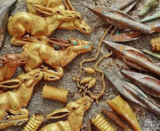 Some of the 3000 gold and metal objects found in the burial mound in Kazakhstan