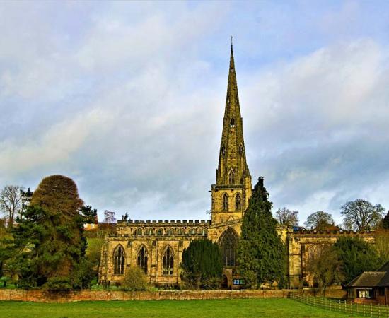 Saint Oswald's Church, Ashbourne, Derbyshire, England, dedicated to King Oswald of Northumbria, who became a saint. 		Source: Peter / Adobe Stock