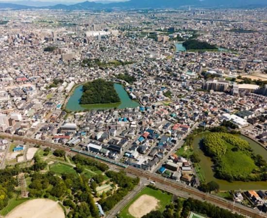 Aerial photo of the Daisenryo Kofun , the largest of the Mozu tombs, a group of megalithic tombs located in Sakai, Japan. Source: TM / Adobe Stock