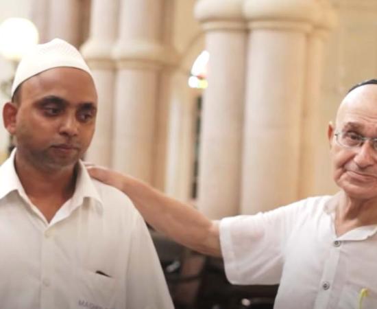 A Muslim and a Jew inside a Jewish synagogue in Kolkata, India. Source: YouTube Screenshot / Atlas Obscura. 