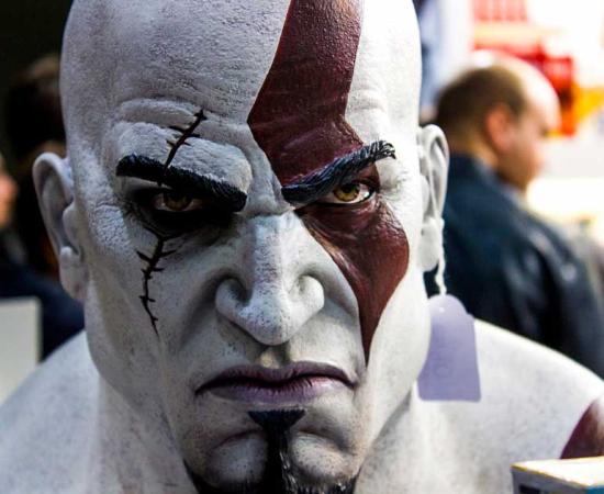 A closeup of Kratos the Greek god of strength, might and power as depicted in the popular video-game series God of War. Source: Matteo Pedrini / CC BY-SA 2.0