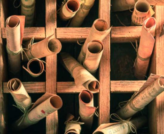 Research of Latin papyrus texts has allowed for a deeper understanding of the Roman world. Representational image of papyrus scrolls. Source: shaiith / Adobe Stock