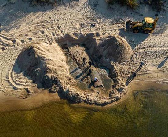An aerial view of the Latvian shipwreck as it was found in deep beach sand near the country’s capital, Riga.		Source: Rigas Brivosta