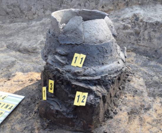 Urn in the grave of the cremated Lusatian discovered in Nové Dědina near Uničov, Czech Republic. 
