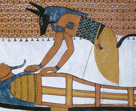 Anubis Reconstructing Osiris (1350 BC, Tomb of Ramses 1, Egypt).