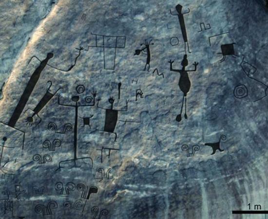 Large petroglyphs found in Western Venezuela. Oblique aerial view of western panel on Picure, with interpretative overlay of main engravings. 