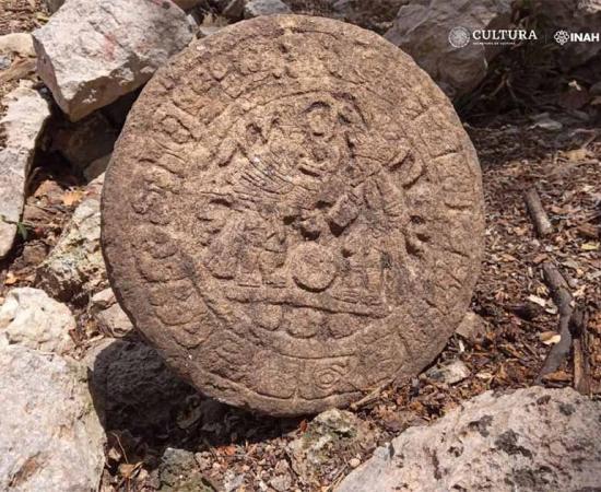 Archaeologists unearthed a stone commemorative disc featuring images of contestants in a Maya ball game at Chichén Itzá in Mexico. Source: INAH