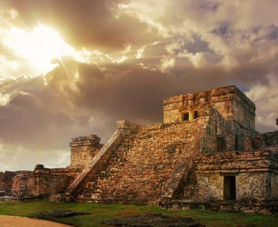 Castillo fortress at sunrise. Do trophy skulls help explain the collapse of the once great empire? Maya Source: soft_light / Adobe Stock