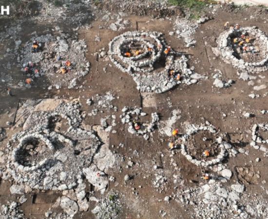 Aerial view of excavated Maya structures at K’oxol Ja’ II