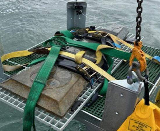 The grave slabs being recovered from the Dorset shipwreck