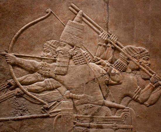 Mesopotamian relief of Assyrian warriors. Credit: kmiragaya / Adobe Stock