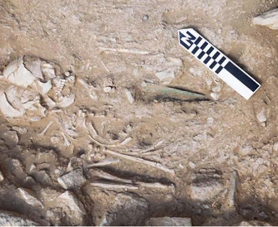 Middle Minoan burials – Left; Middle Minoan IA beads, Center; IA primary pit burial of a man, with a bronze dagger (under Funerary Building 2), Right; Early Minoan II and Middle Minoan IA beads and bands of gold.