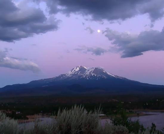 “Full moon rising over Mount Shasta, as seen from northern valley.” 