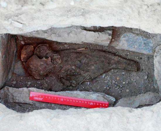 The baby was buried in tightly closed stone box, so the body was in an isolated air chamber for over 1,500 years.