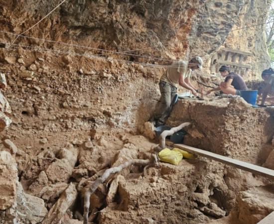 Archaeologists work inside Aguilón P5 during the 2026 excavation campaign. 